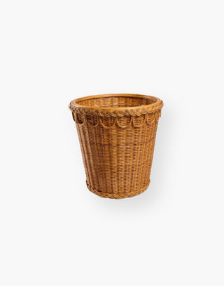 Large handwoven and braided rattan pot for gardening or indoor use.