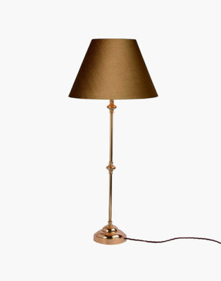 Distressed Finish with Taupe Shade Provencal table lamps: simple, solid brass narrow lamps ideal for console or side tables.