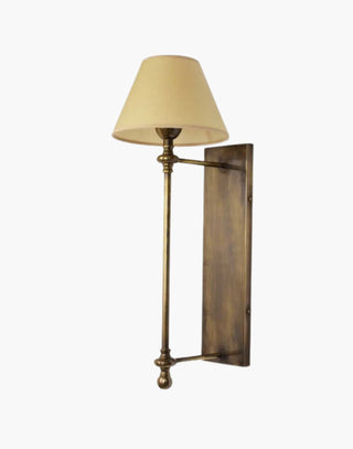 Distressed Finish with Ivory Shade Provencal wall lights: Elegant cast brass fixtures inspired by 19th-century French design. Customizable shades available.