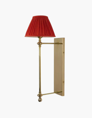 Polished Lacquered Finish with Red Shade Provencal wall lights: Elegant cast brass fixtures inspired by 19th-century French design. Customizable shades available.