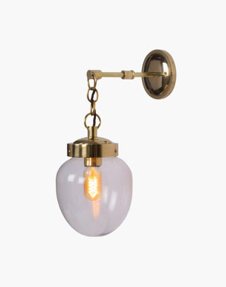 Unlacquered Natural Finish with Clear Glass Charleston Wall Light: Solid brass mid-century style lighting. Suitable for outdoor use.