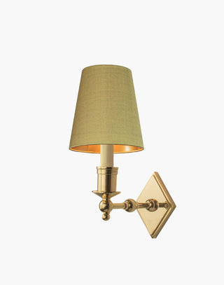 Polished Lacquered finish with d6 Gold shade, elegant solid brass sconce with diamond backplate. Perfect for modern or traditional interiors.
