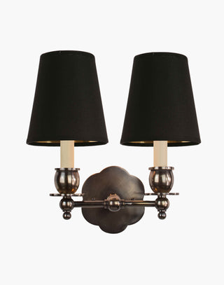 Distressed Finish with D6G Black Shade India Rose Sconces: Solid brass petal design. Versatile for contemporary or traditional settings.