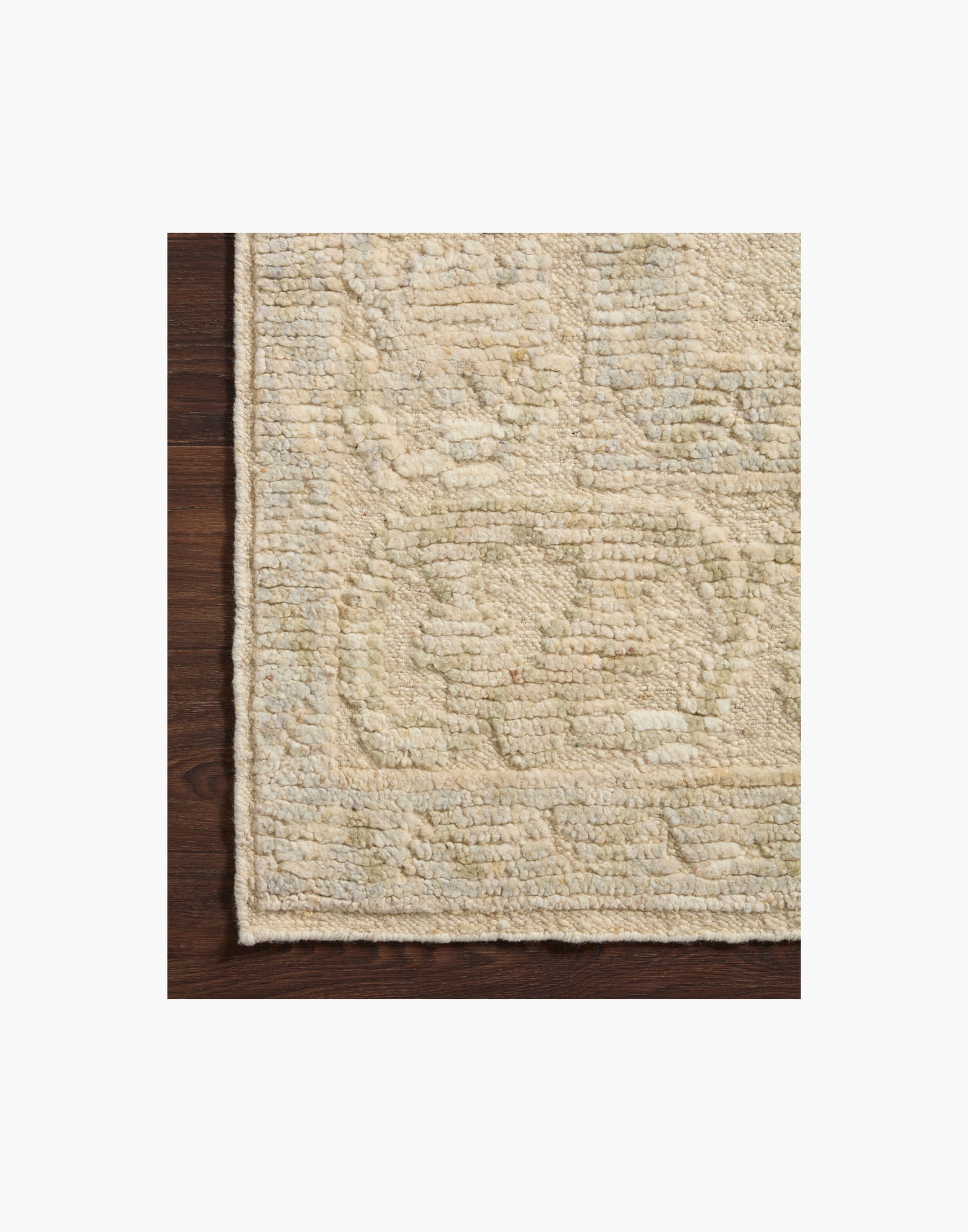 Hand knotted wool area rug from the Emilia Collection with subtle raised texture and neutral painterly design