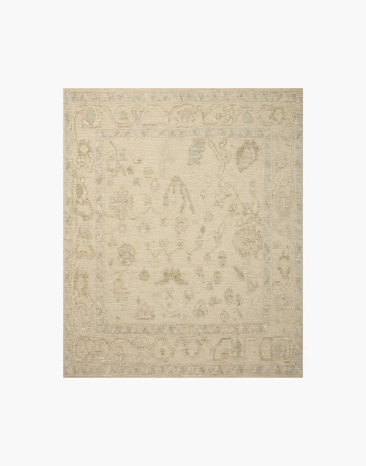 Hand knotted wool area rug from the Emilia Collection with subtle raised texture and neutral painterly design