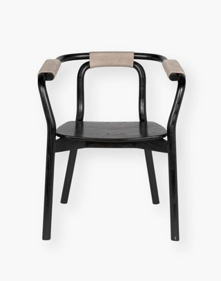 Charcoal black dining chair with dominant jointing points in natural paper cord.