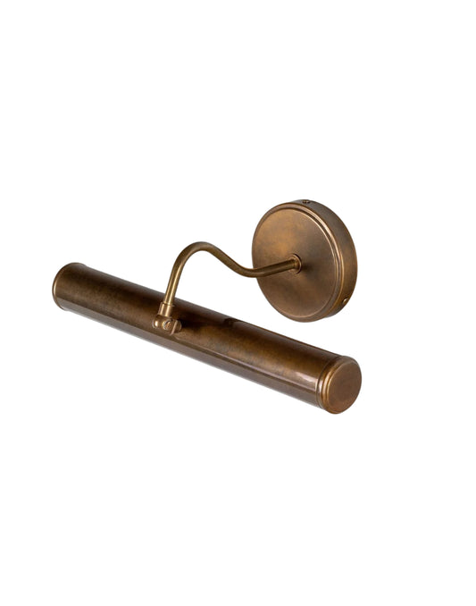 Solid brass picture light with adjustable curved arm and cylindrical shade, aged brass finish, perfect for highlighting artwork in traditional or modern interiors.