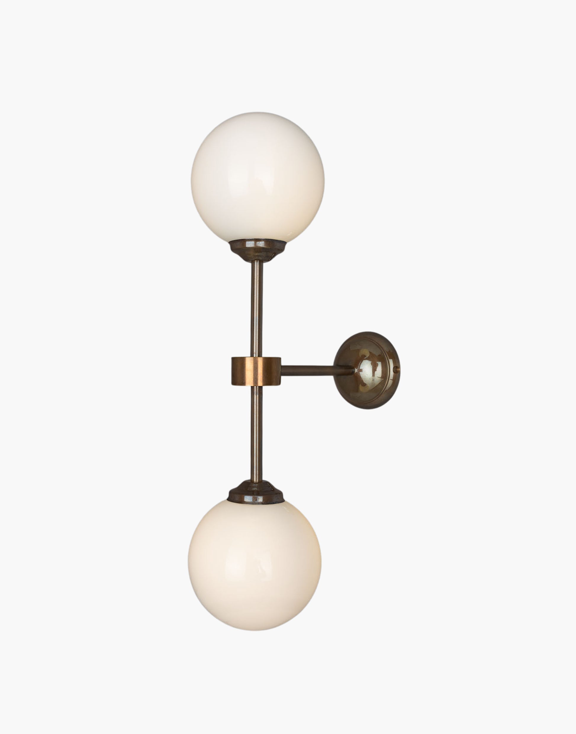 Double Globe Wall Sconce brass frame, two opal glass globes, soft ambient lighting for hallways, living rooms, or boutique hotels