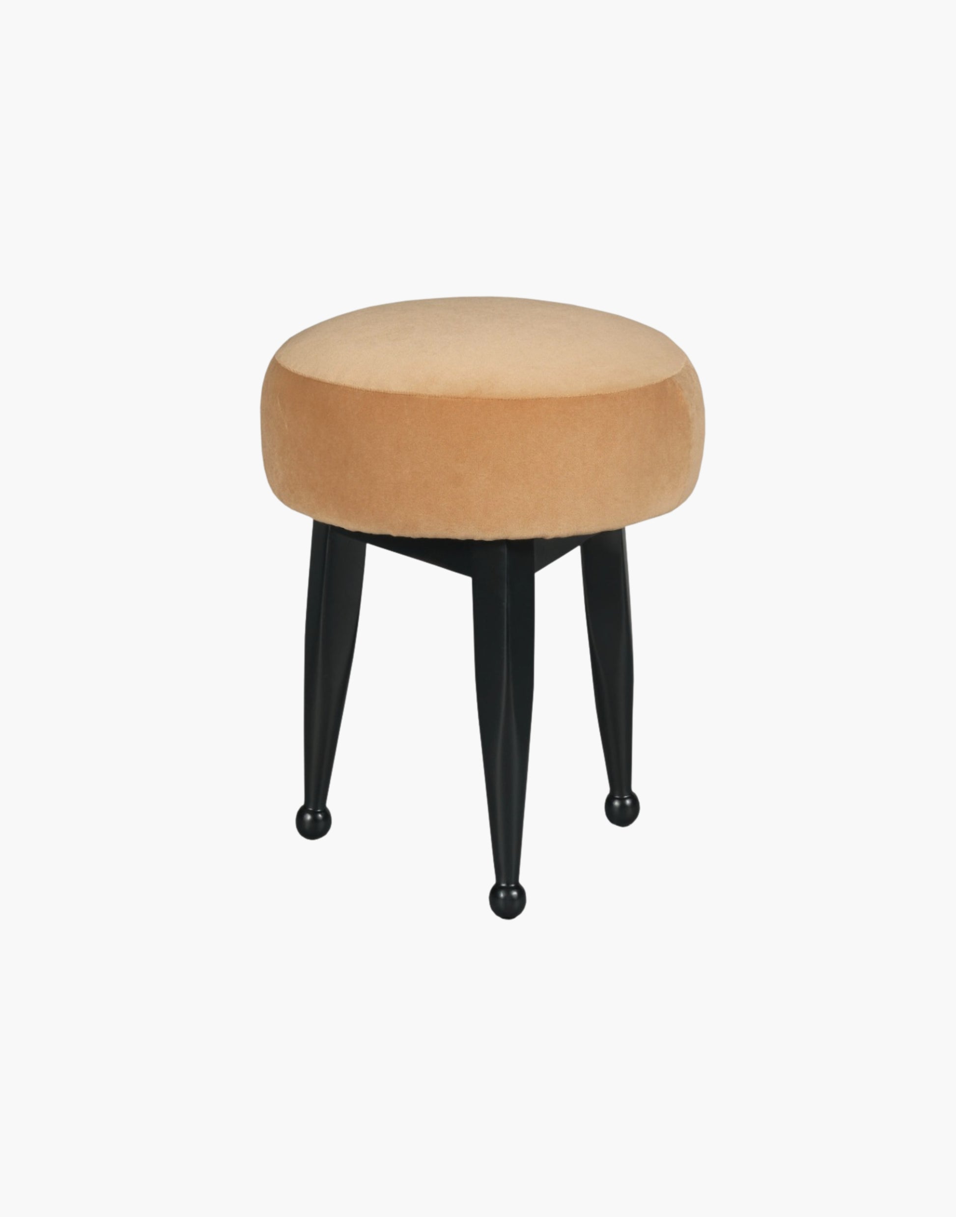Ottoman with circular mushroom-shaped upholstered seat, three tapering legs with ball-shaped turnings, crafted from hardwood solids, available in Amsterdam Black or Banks Caramel Velvet.