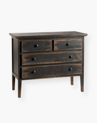 four drawer black nightstand with matching black knobs and distressed paint detail