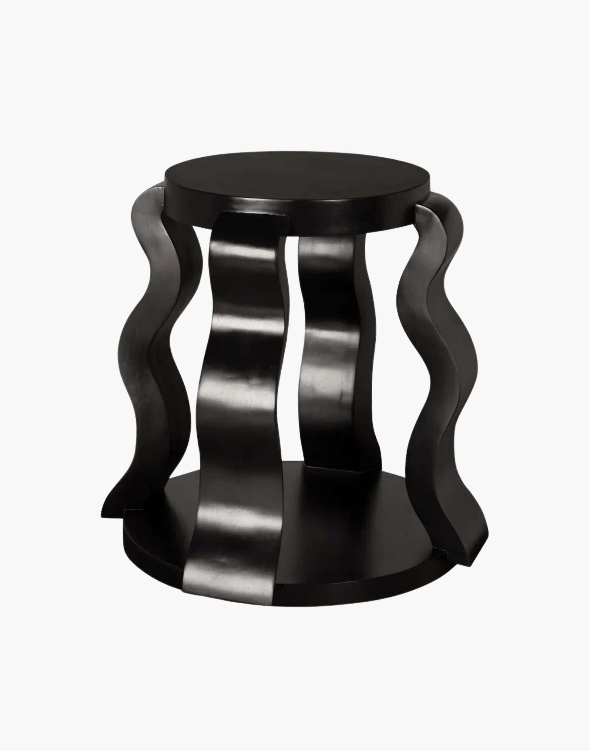 Round black side table with sculptural ribbon legs and open shelf in hand-rubbed black finish.