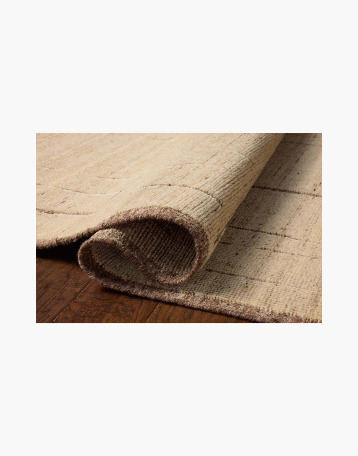 Hand-knotted wool and cotton rug in brown and antique ivory tones