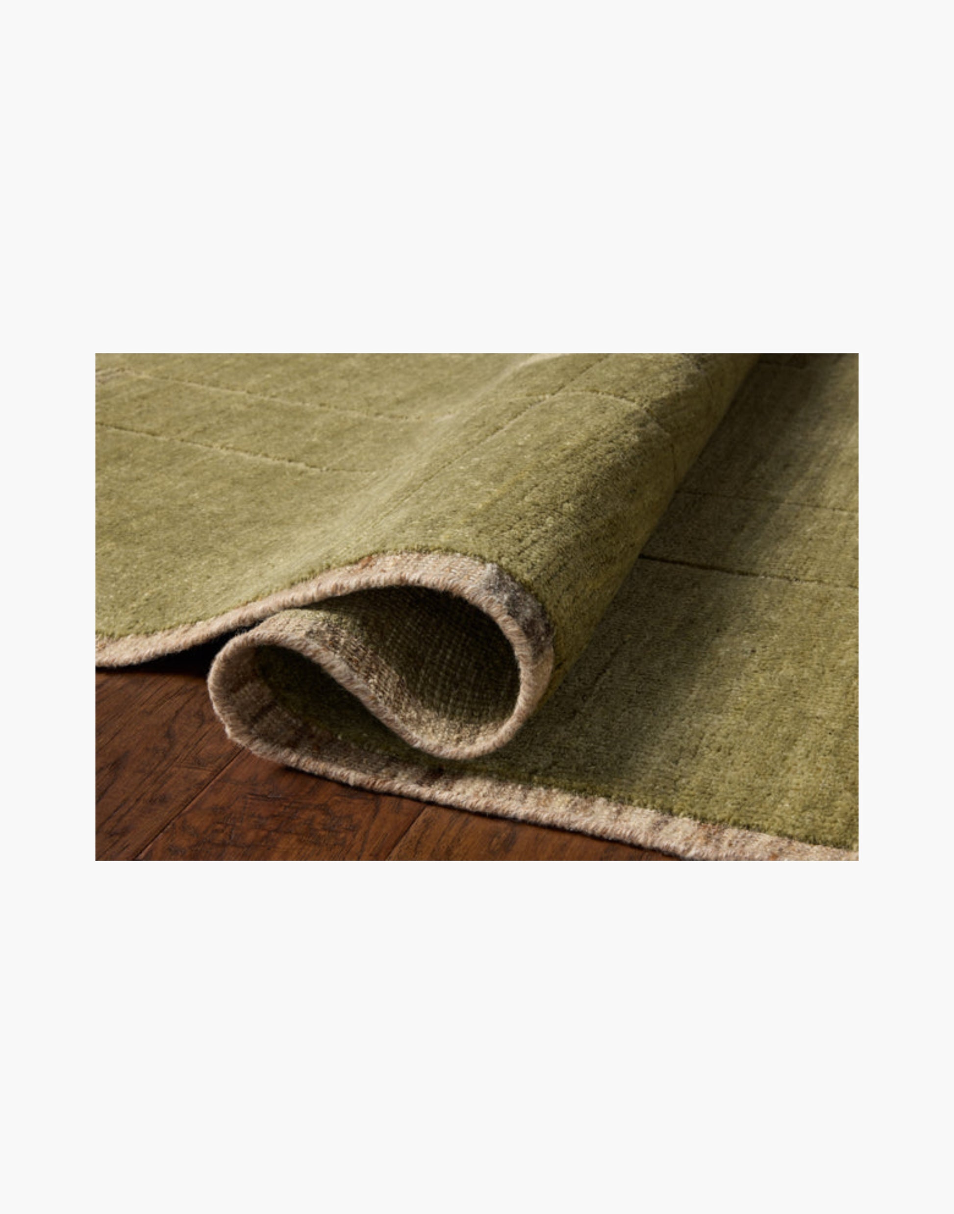 Hand-knotted wool and cotton rug in natural and moss tones
