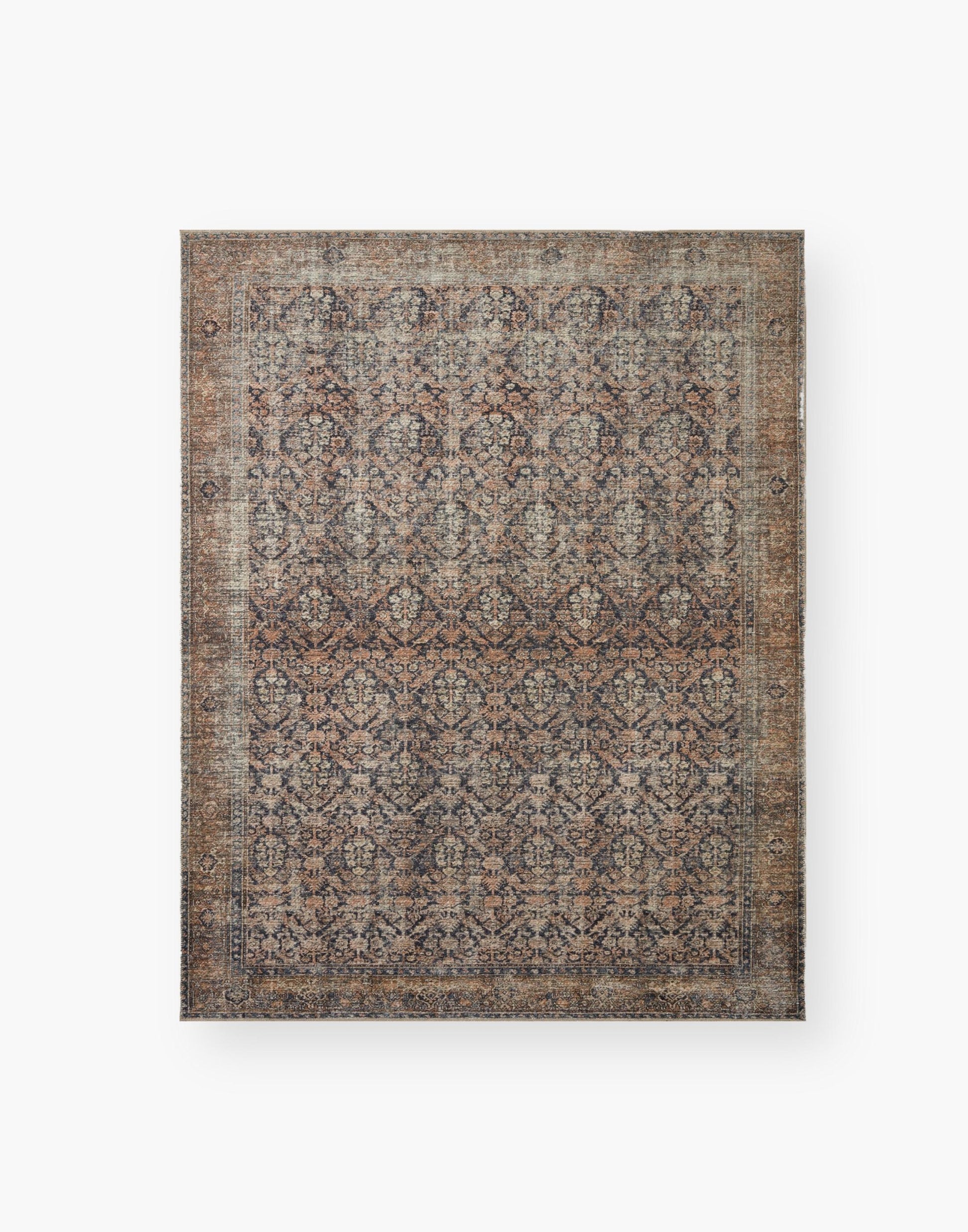 Ink and Salmon colored rug with a well-worn antique look.