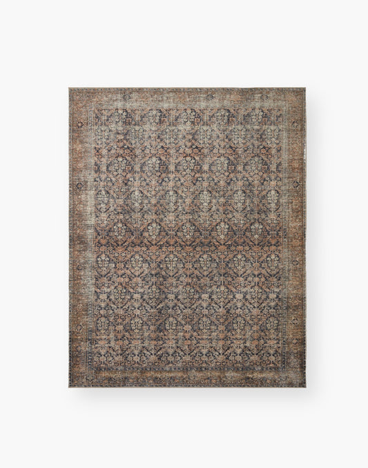 Ink and Salmon colored rug with a well-worn antique look.