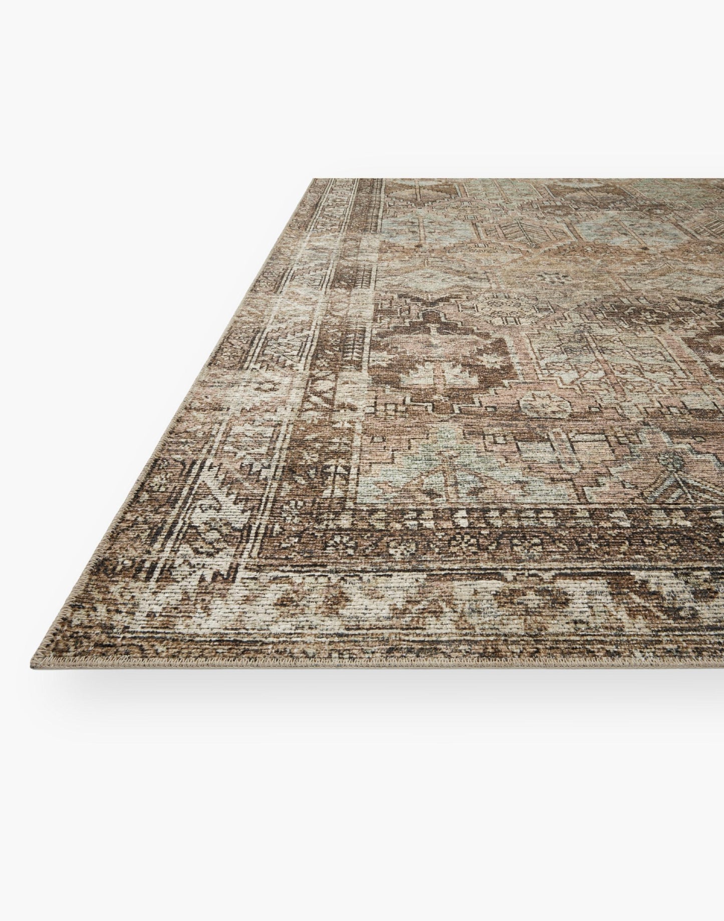 Power Loomed Rug with Clay and Sage Coloring.