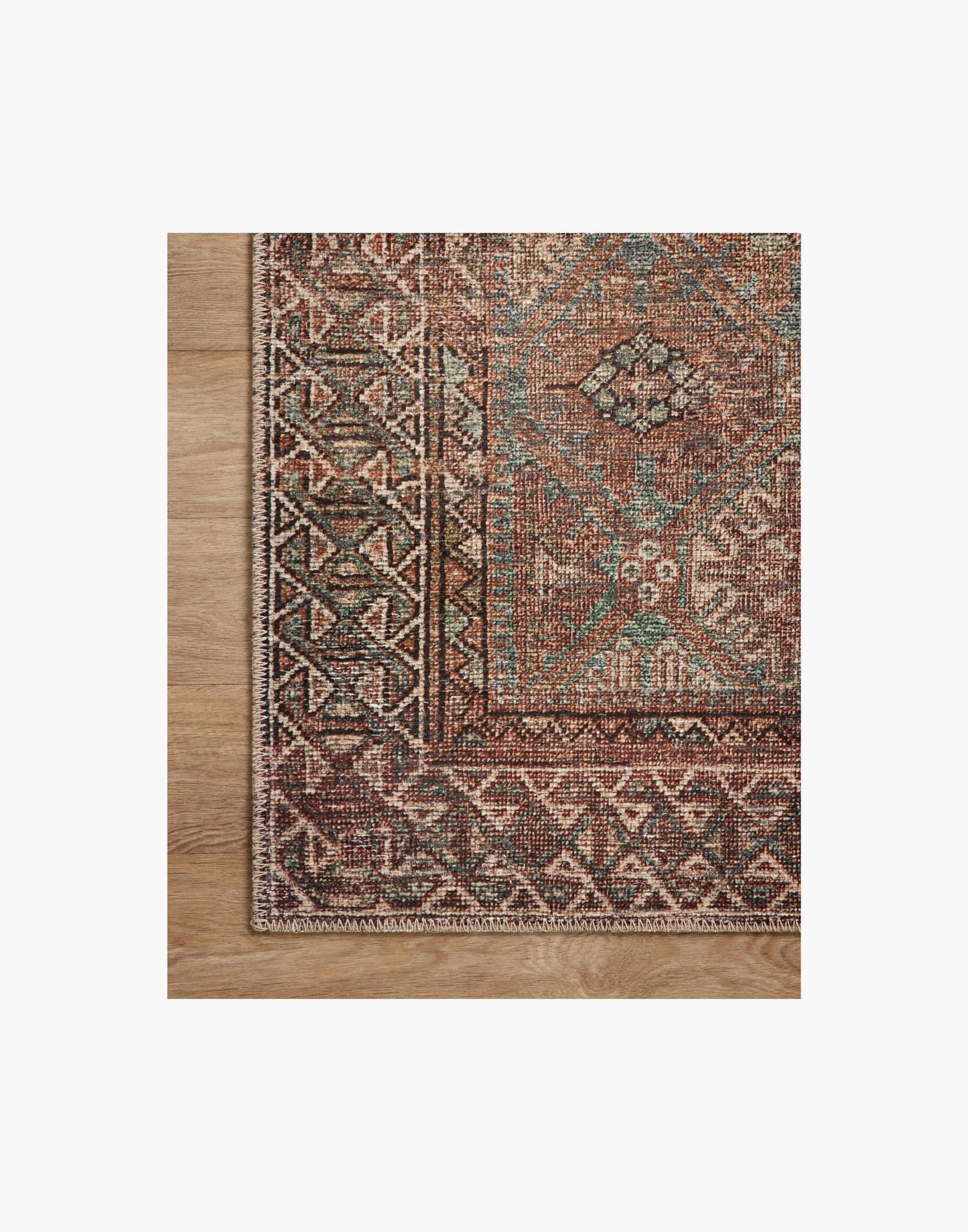 Amber Lewis x Loloi Billie Collection rug with distressed antique-inspired pattern and rich colo