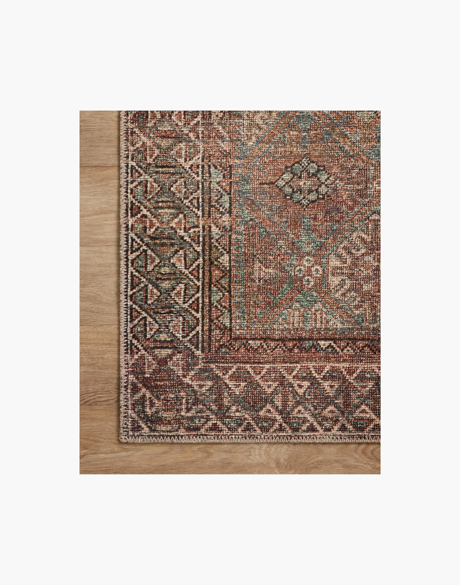 Amber Lewis x Loloi Billie Collection rug with distressed antique-inspired pattern and rich colo