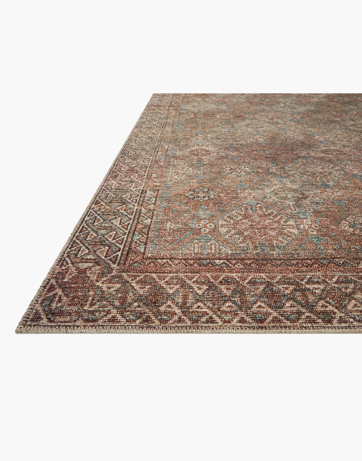 Amber Lewis x Loloi Billie Collection rug with distressed antique-inspired pattern and rich colo