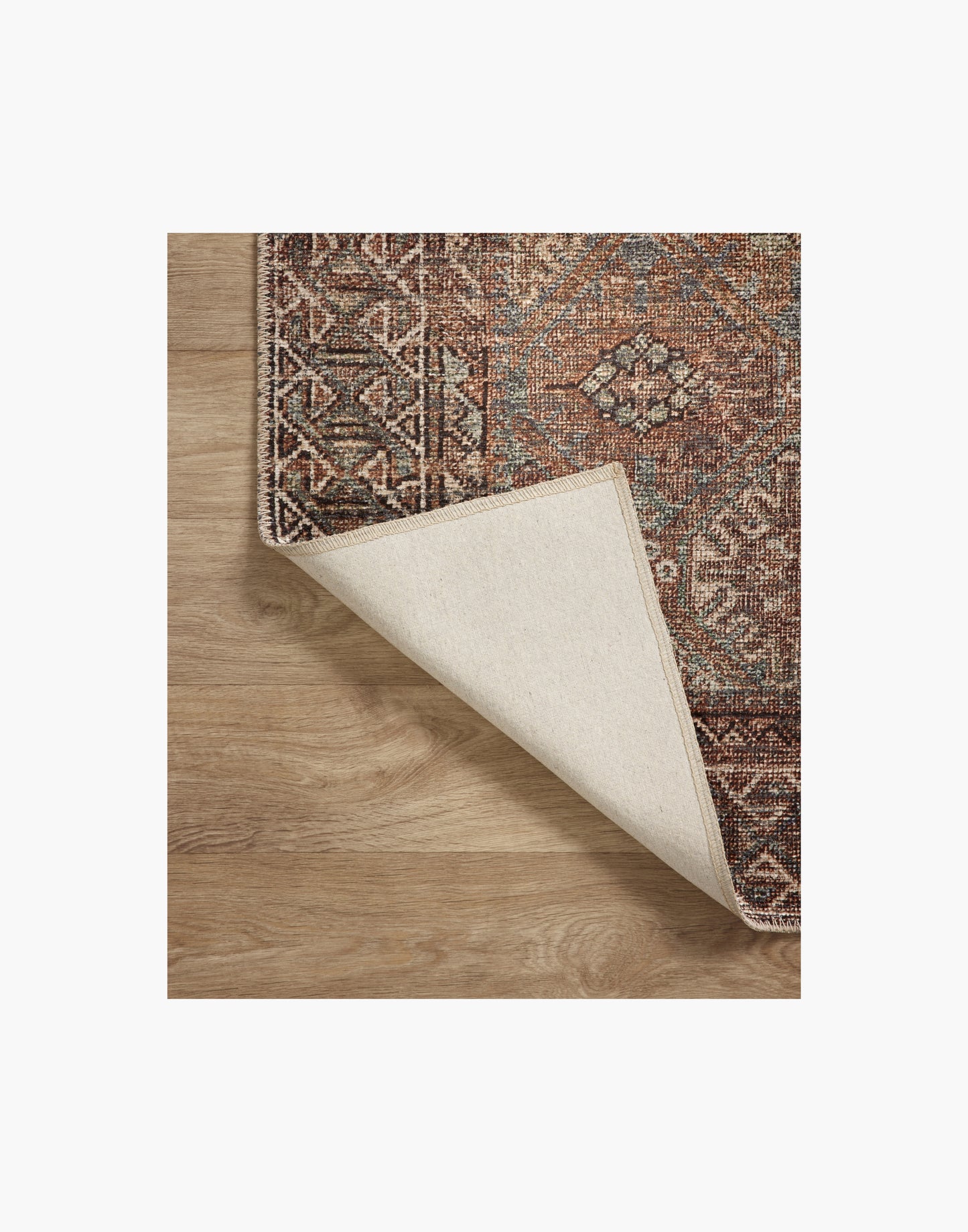 Amber Lewis x Loloi Billie Collection rug with distressed antique-inspired pattern and rich colo