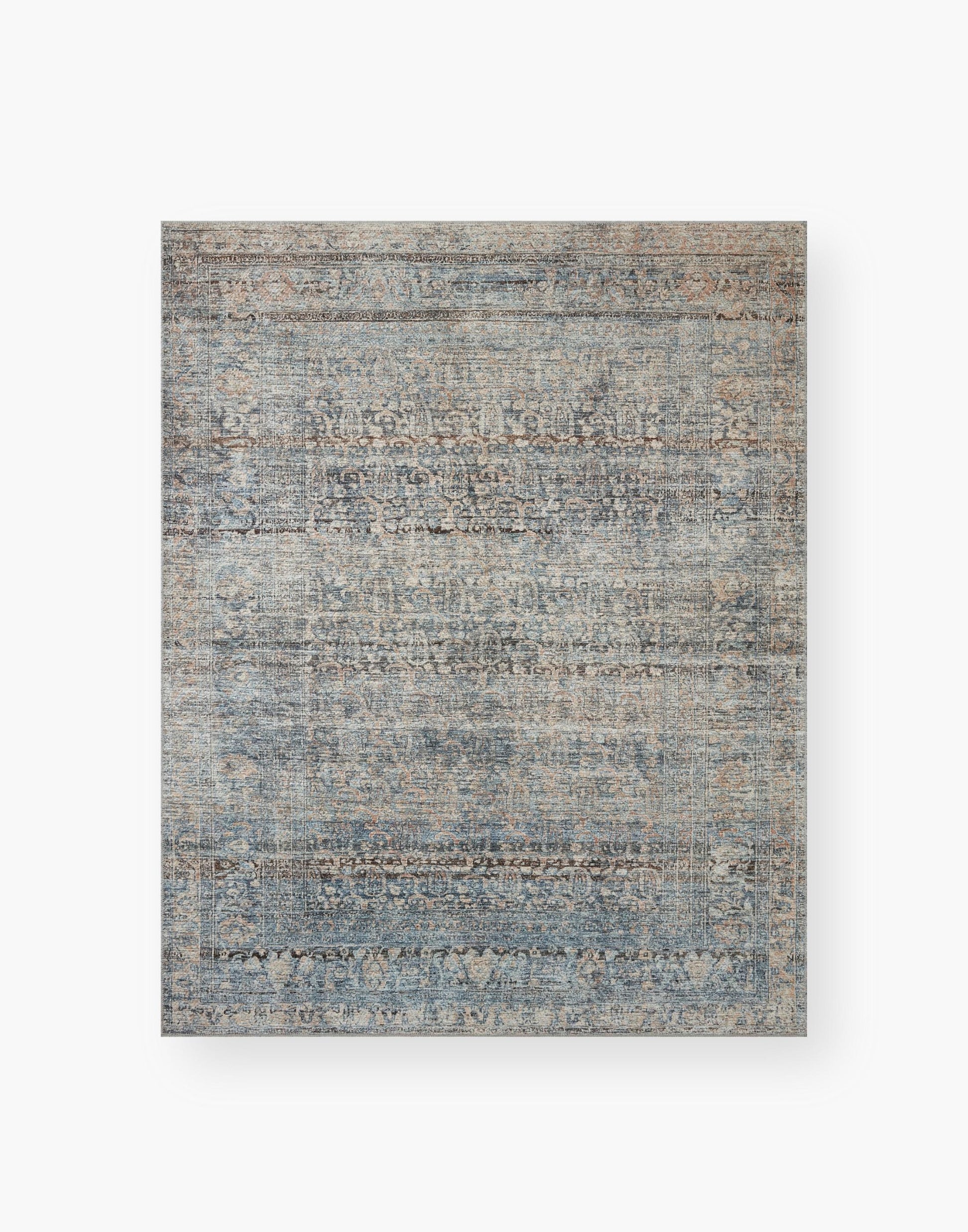Power Loomed Rug with Denim and Blush Colors.
