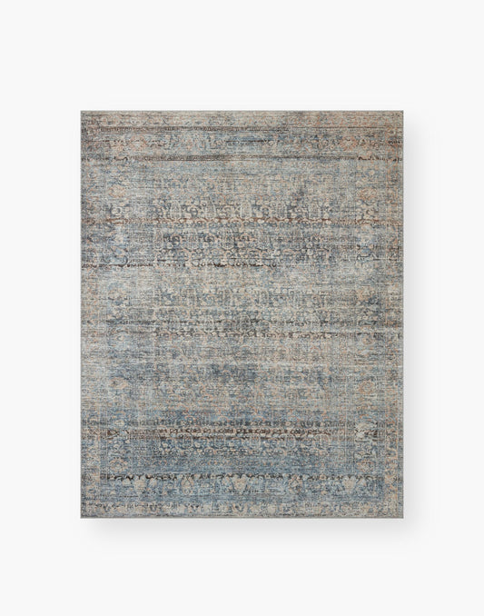 Power Loomed Rug with Denim and Blush Colors.
