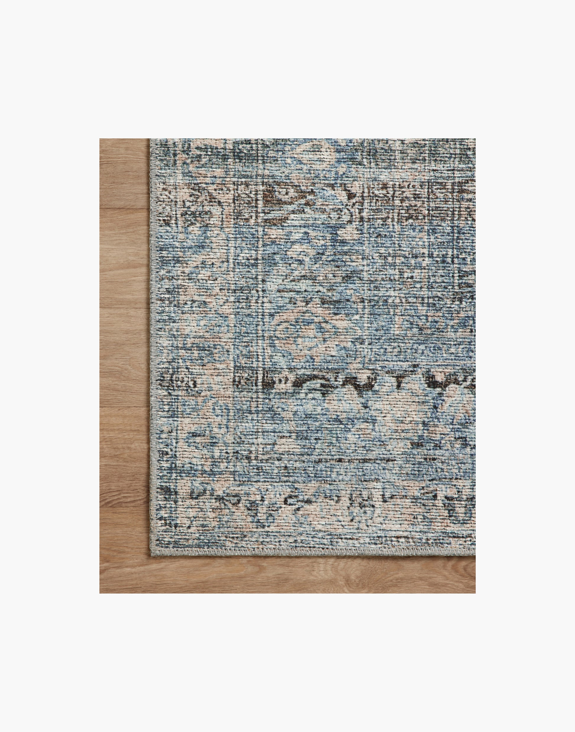 Amber Lewis x Loloi Billie Collection rug with distressed pattern and richly saturated colors