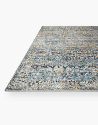 Power Loomed Rug with Denim and Blush Colors.