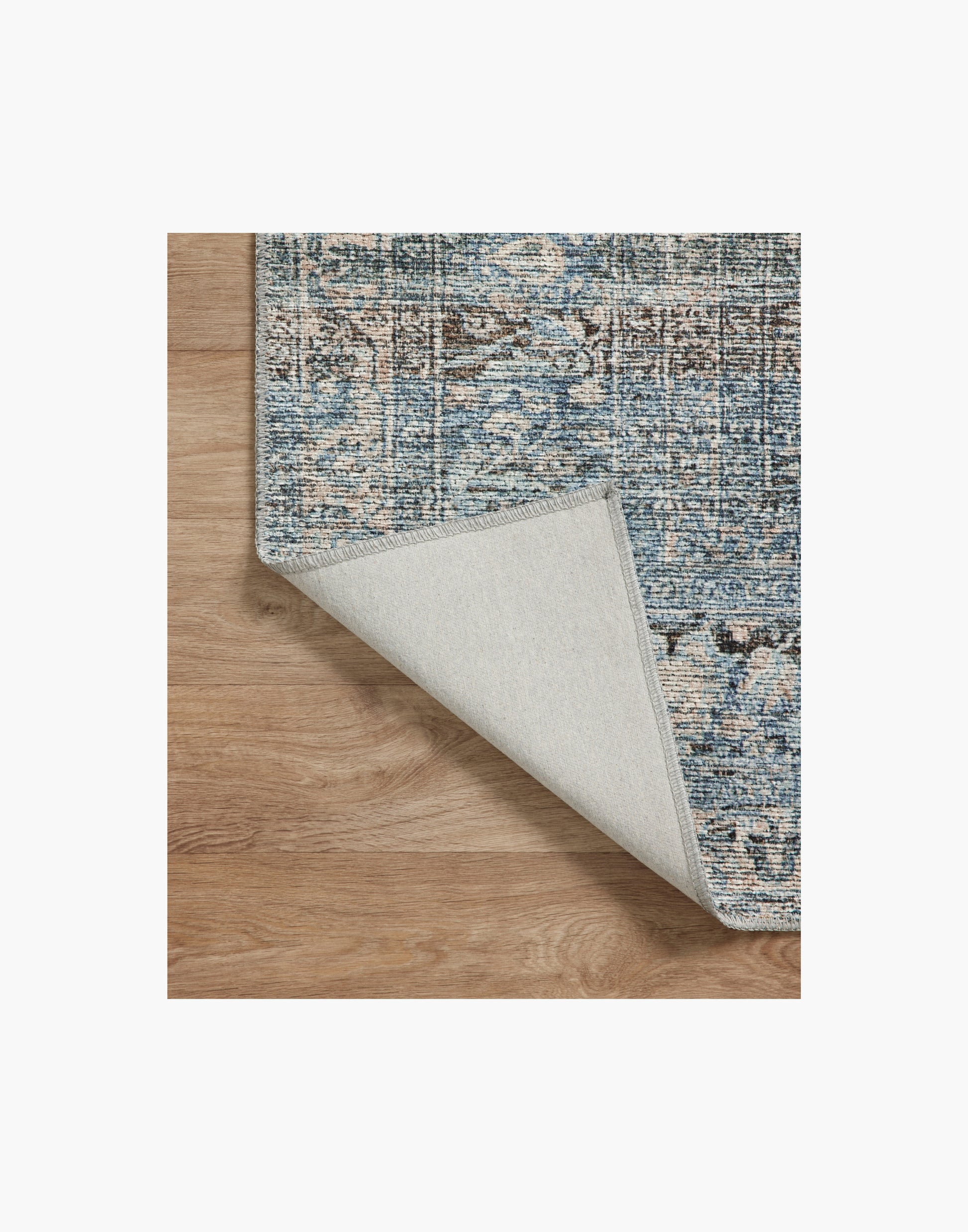 Amber Lewis x Loloi Billie Collection rug with distressed pattern and richly saturated colors