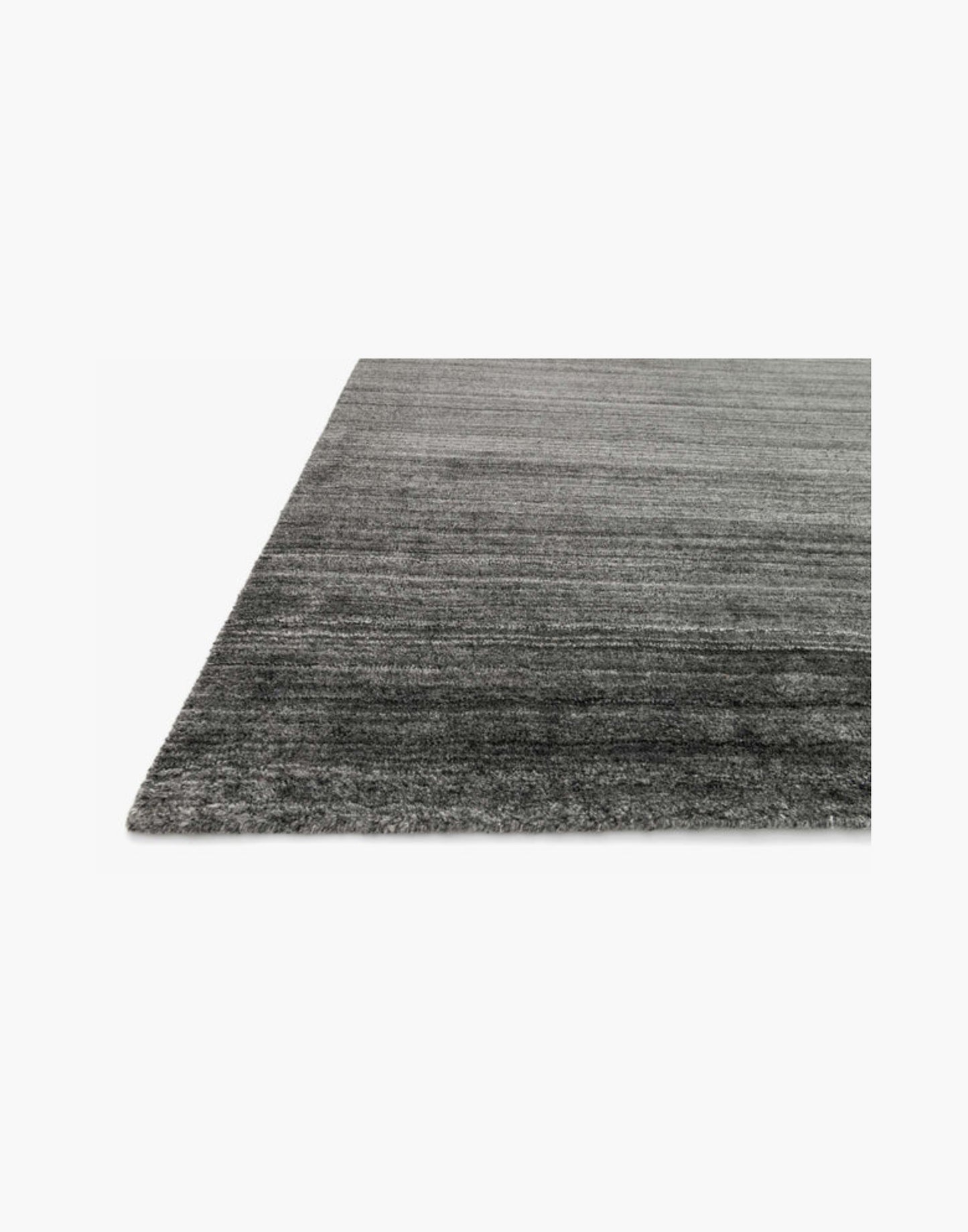 Hand-loomed charcoal rug with rayon and wool pile in rich dark tones