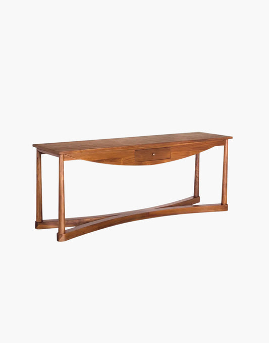 bow front teak console table with curved silhouette and natural wood grain