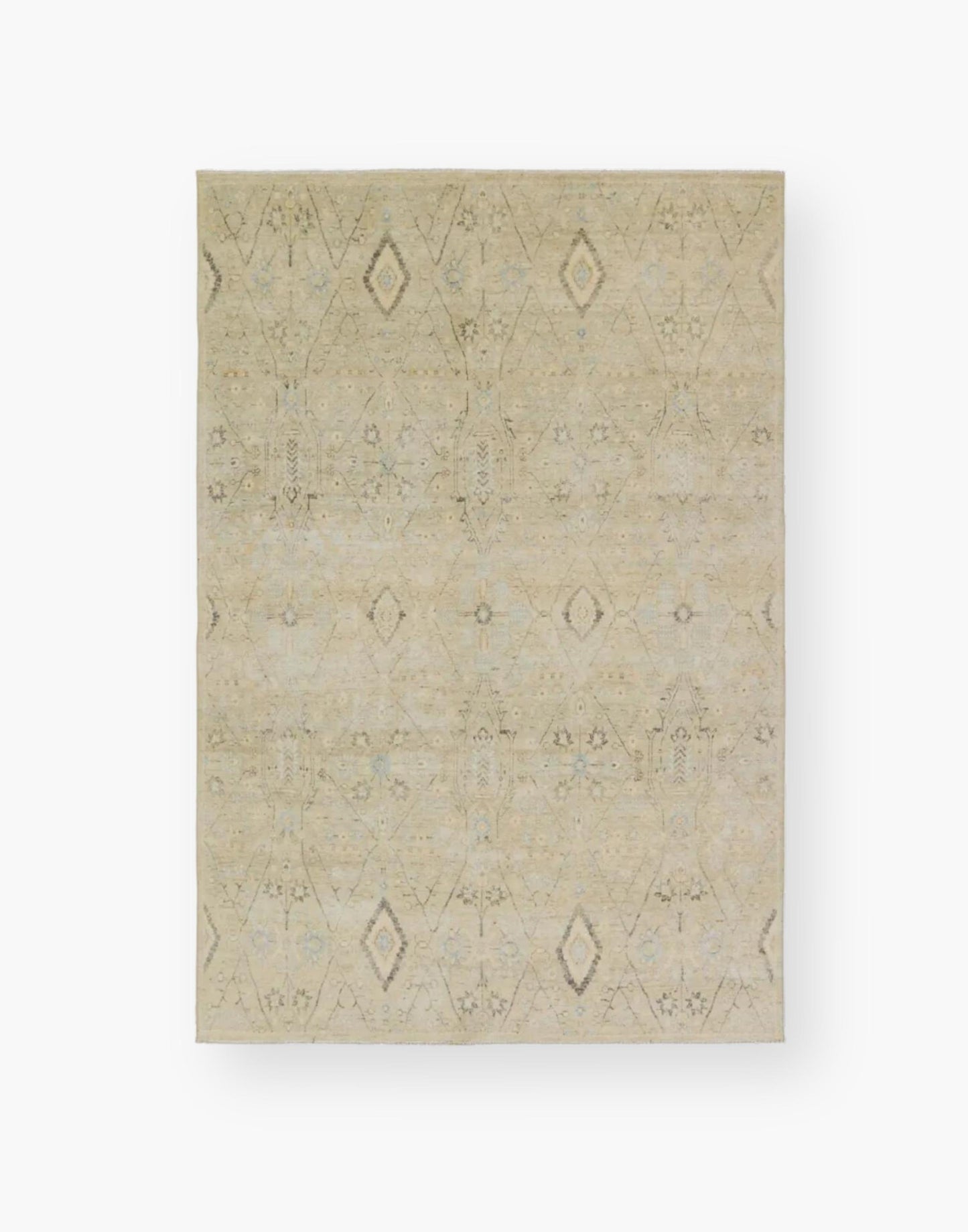 Power loomed area rug with a trellis pattern, short fringe and geometric details in light blue, pastel green, yellow, navy, and cream colorway.