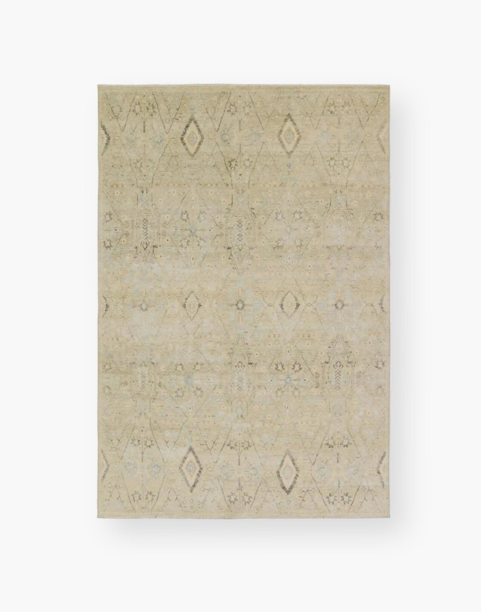 Power loomed area rug with a trellis pattern, short fringe and geometric details in light blue, pastel green, yellow, navy, and cream colorway.