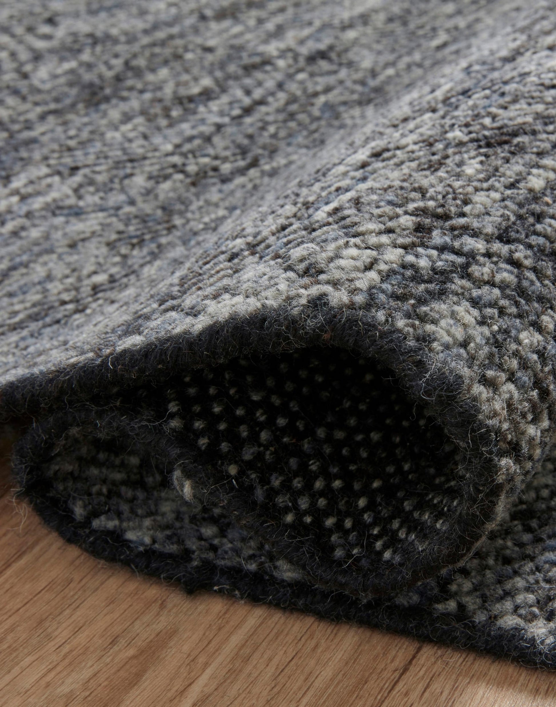 Hand Knotted Rug with Charcoal and Denim Colors.