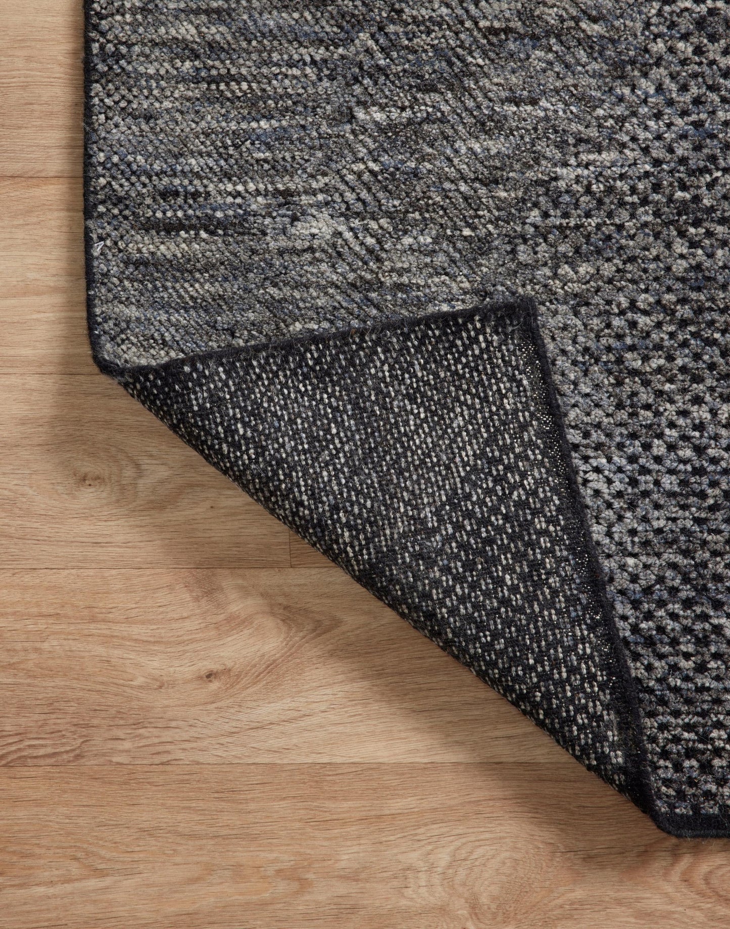 Hand Knotted Rug with Charcoal and Denim Colors.