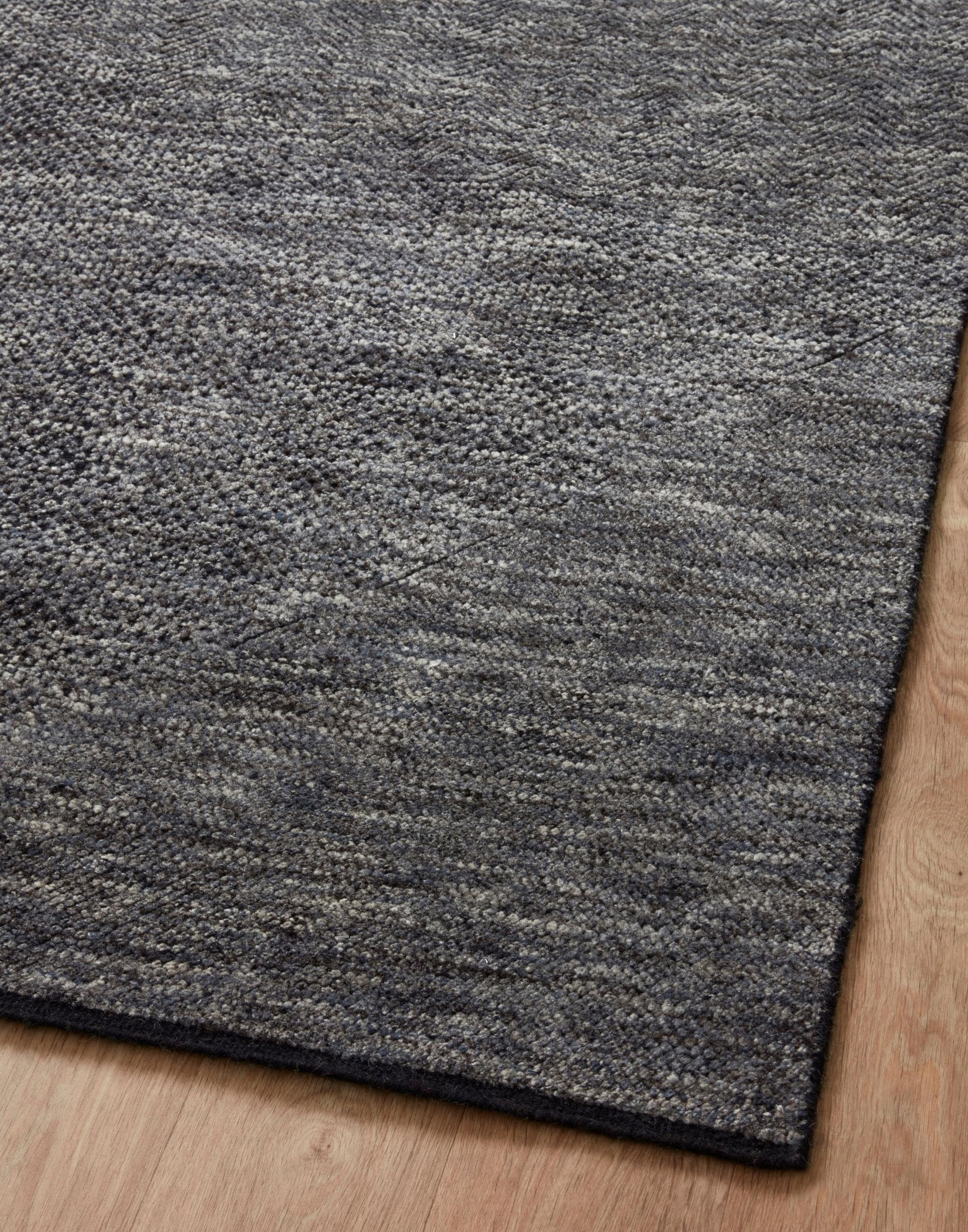 Hand Knotted Rug with Charcoal and Denim Colors.