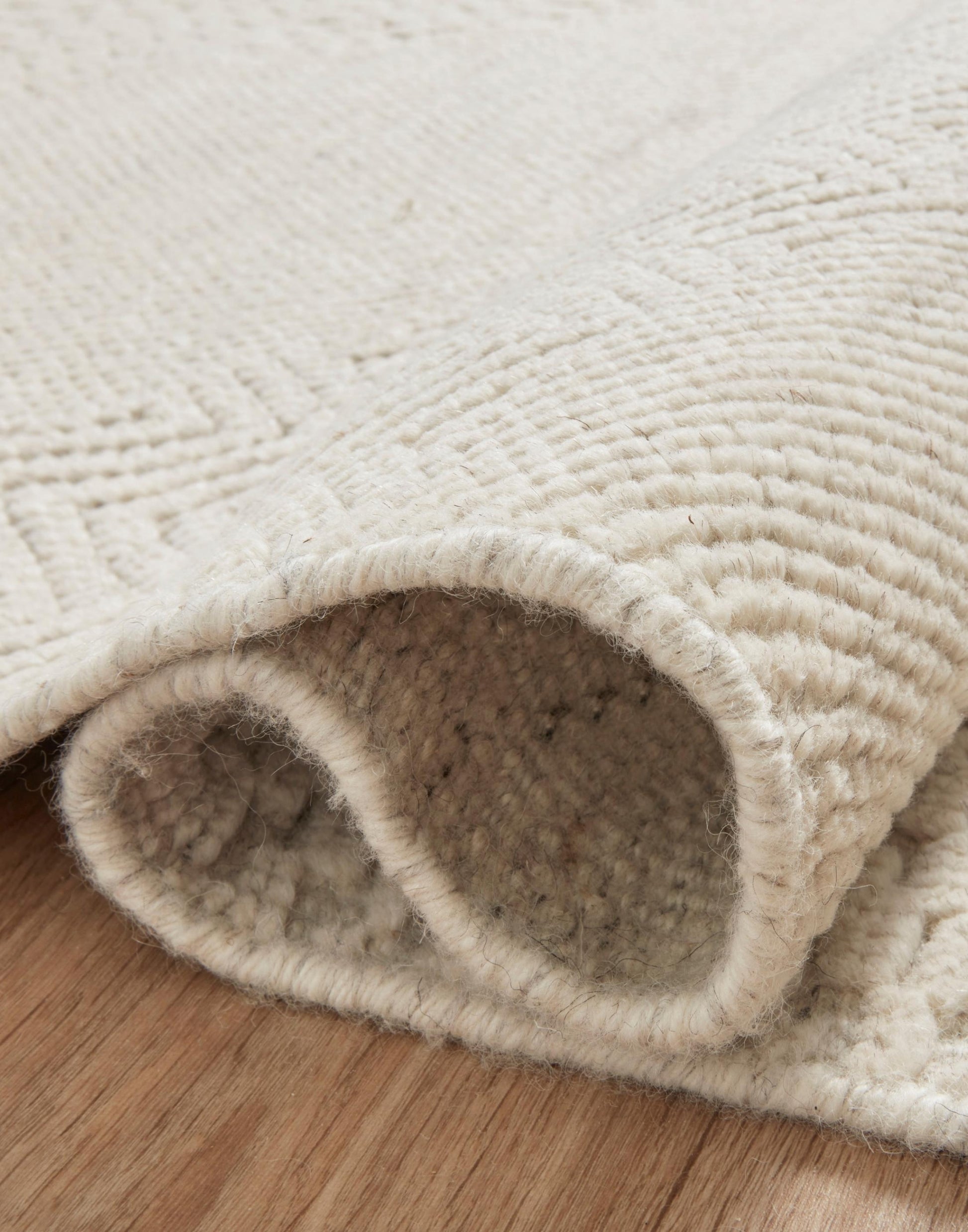 Hand Knotted Rug in Ivory.