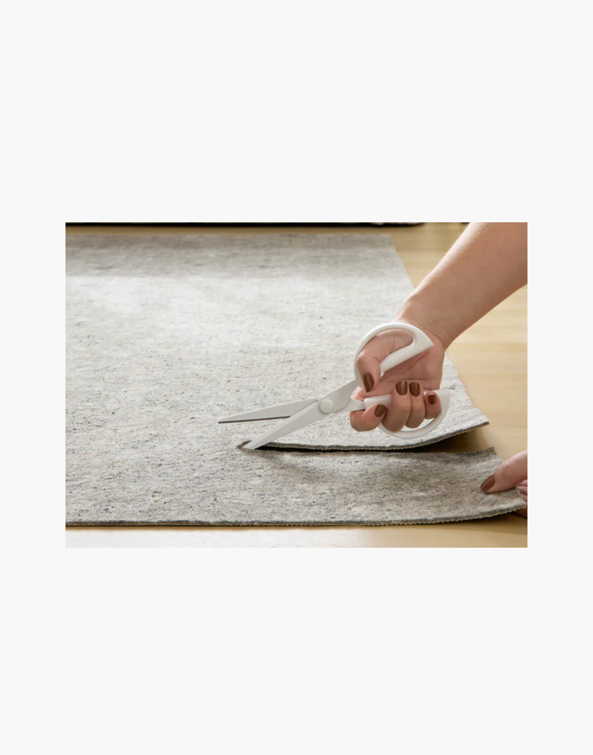 Grey non-slip rug pad with rubber backing, 100% recycled fibers, fits rugs on hard floors and carpet