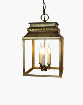 Medium Bordeaux Hanging Lantern in solid brass with intricate fretwork and top detailing, inspired by 19th-century French design. Perfect for indoor and outdoor use, ideal for hallways and stairwells.