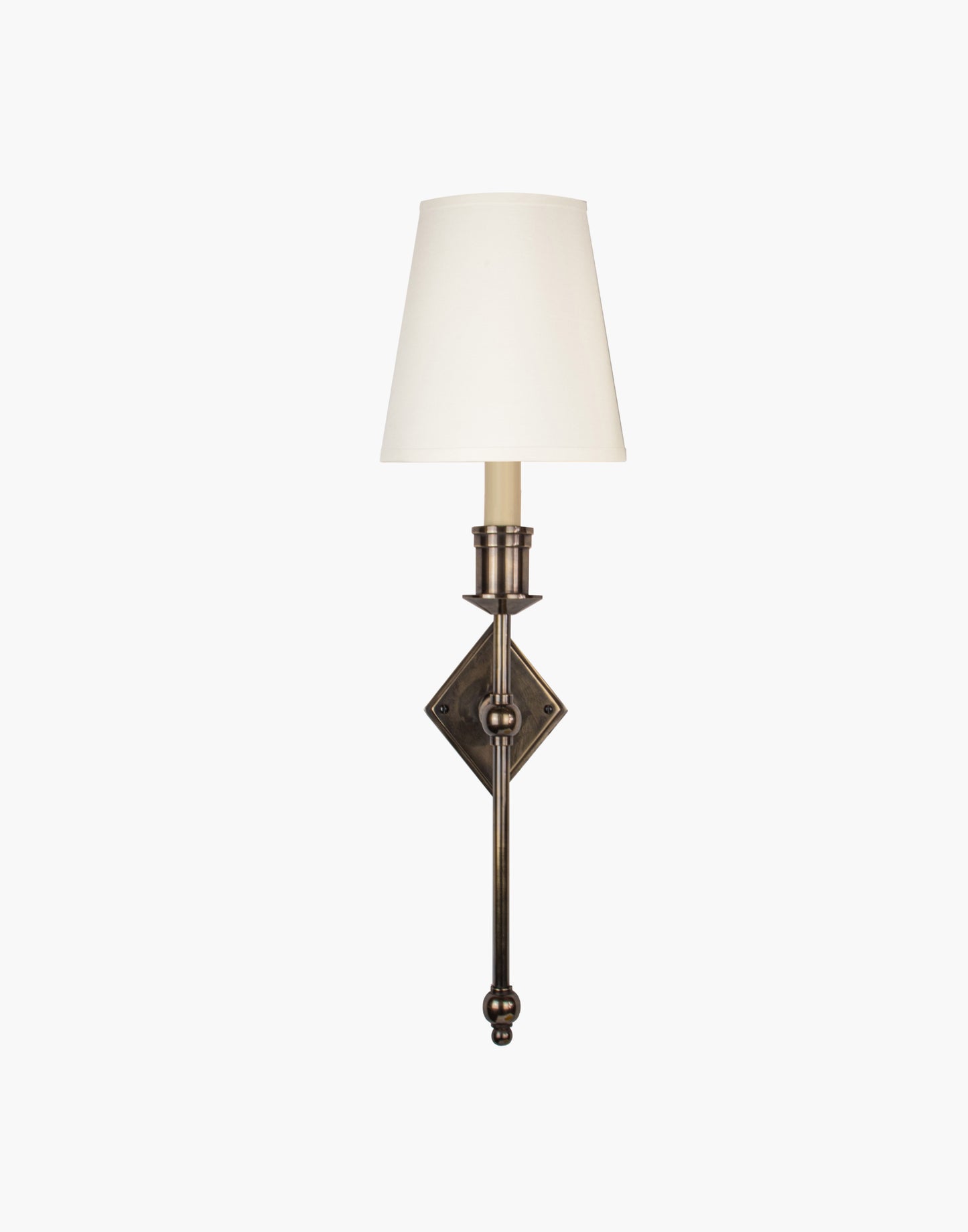Wall sconce in cast and machined brass with diamond-shaped scalloped backplate and optional shade.
