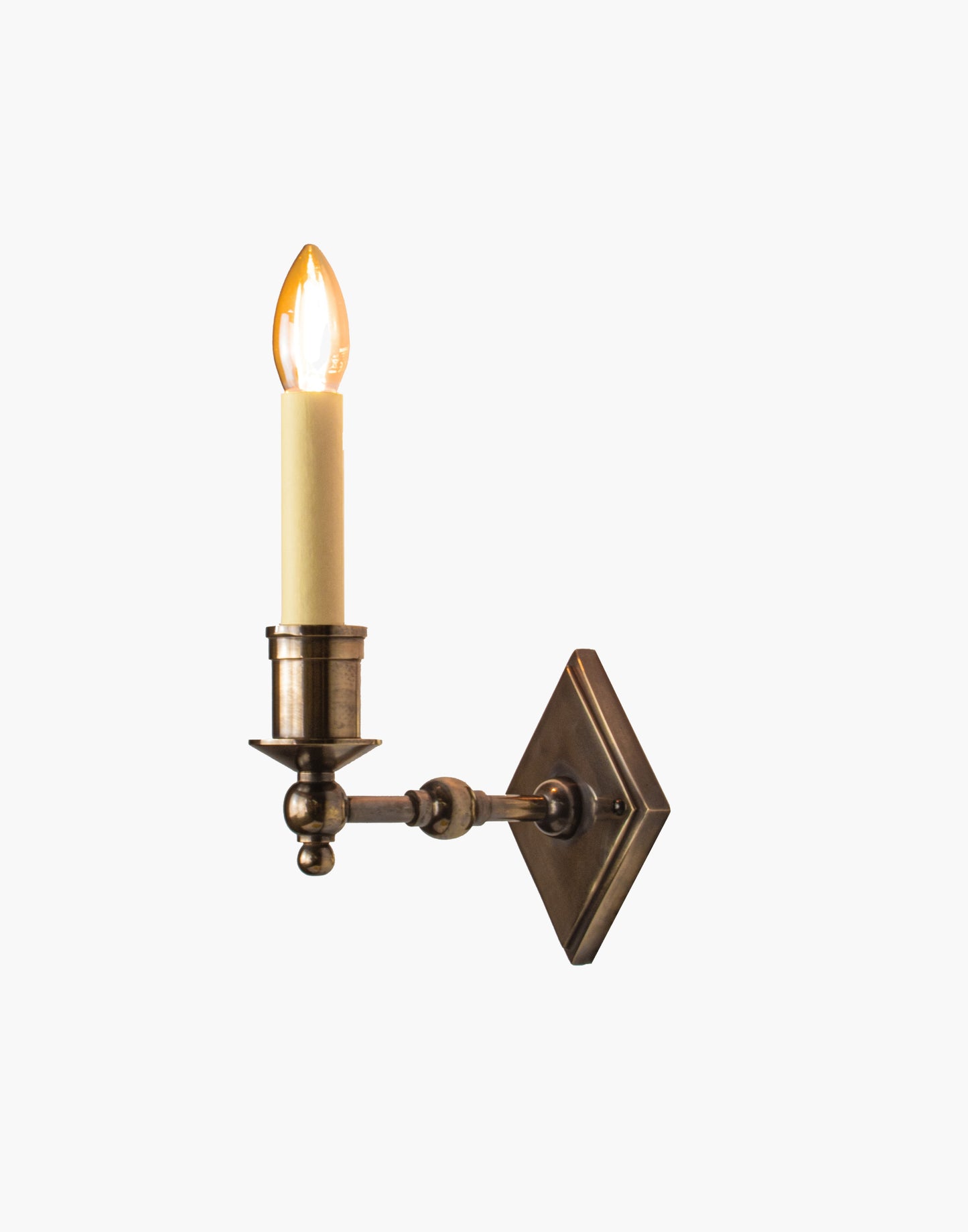Brass wall sconce with diamond-shaped scalloped backplate and optional shade, cast and machined brass wall light.