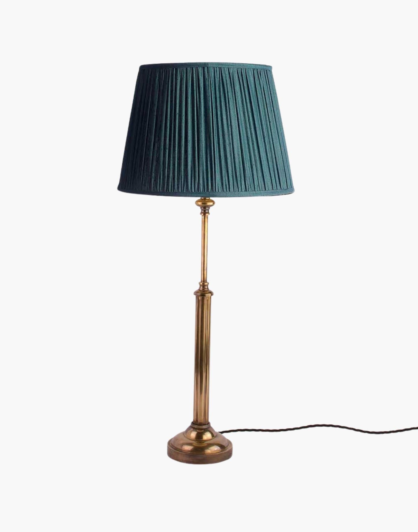 Brass table lamp with fluted stem and cast ball detail, colonial-style table lamp available with or without shade.