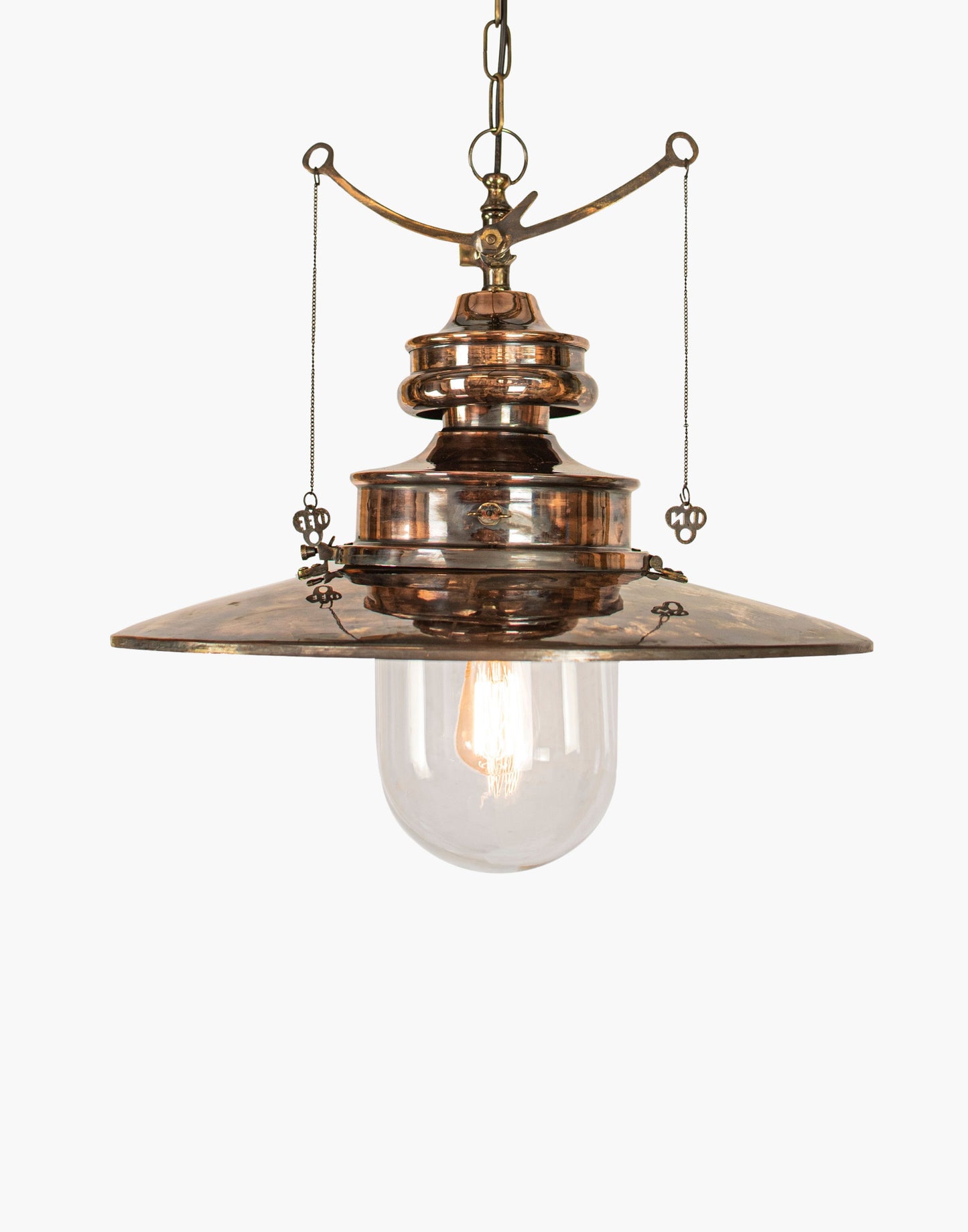 pendant light in solid copper with brass details and clear or opal glass shade