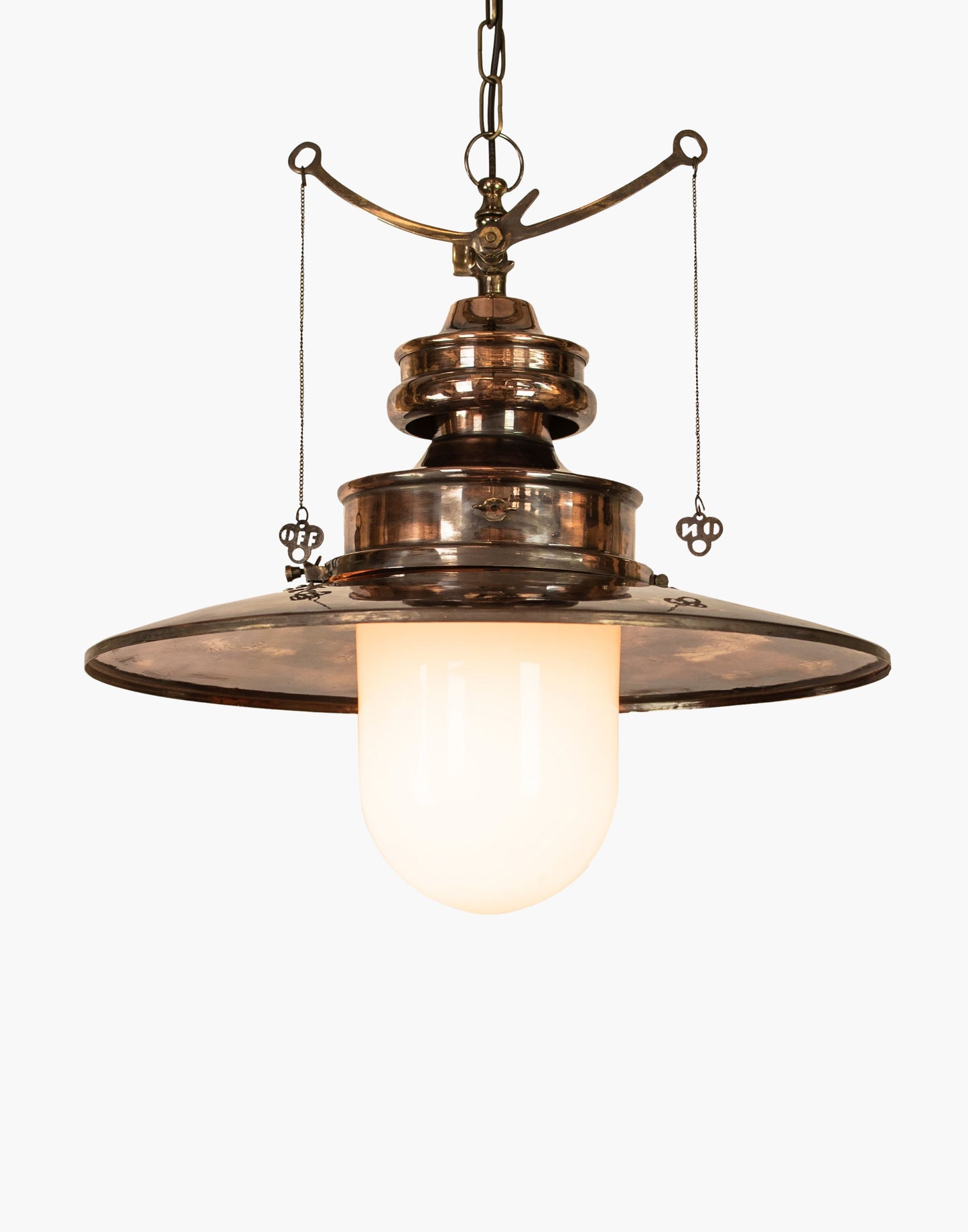 pendant light in solid copper with brass details and clear or opal glass shade