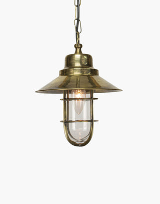 Wheelhouse Nautical Pendant in solid brass with clear glass. Inspired by ship lights from 1910, perfect for nautical-themed interiors.