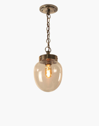 The Charleston Pendant Light solid brass light with mid-century design, available in five finishes with clear or opal glass. IP44-rated flush version suitable for Zone 2 bathrooms. Hanging and flush options for covered outdoor areas.