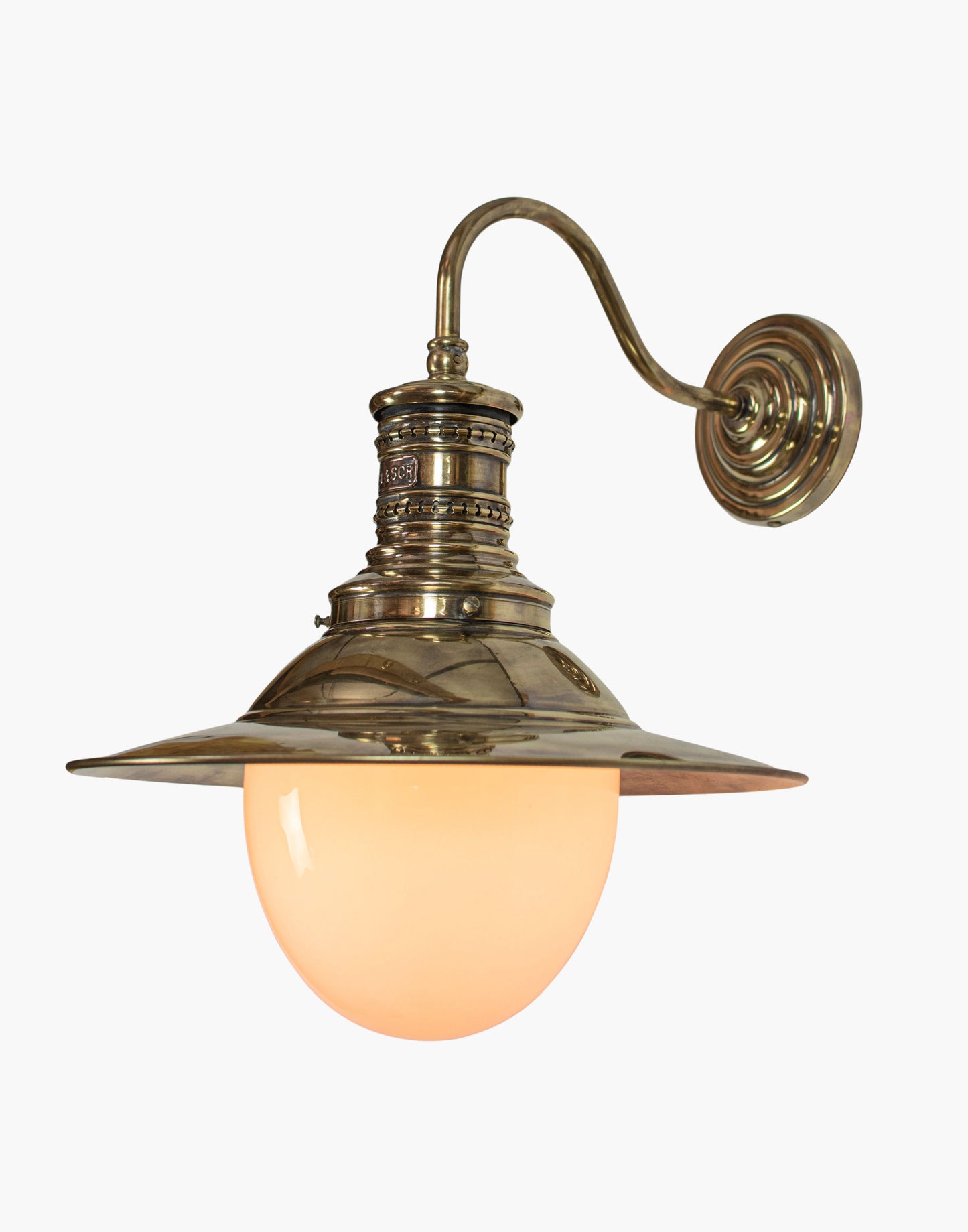 Wall lamp in solid brass with copper LBSCR label, replica railway station wall light from Victoria Station London, available in clear or opal glass.
