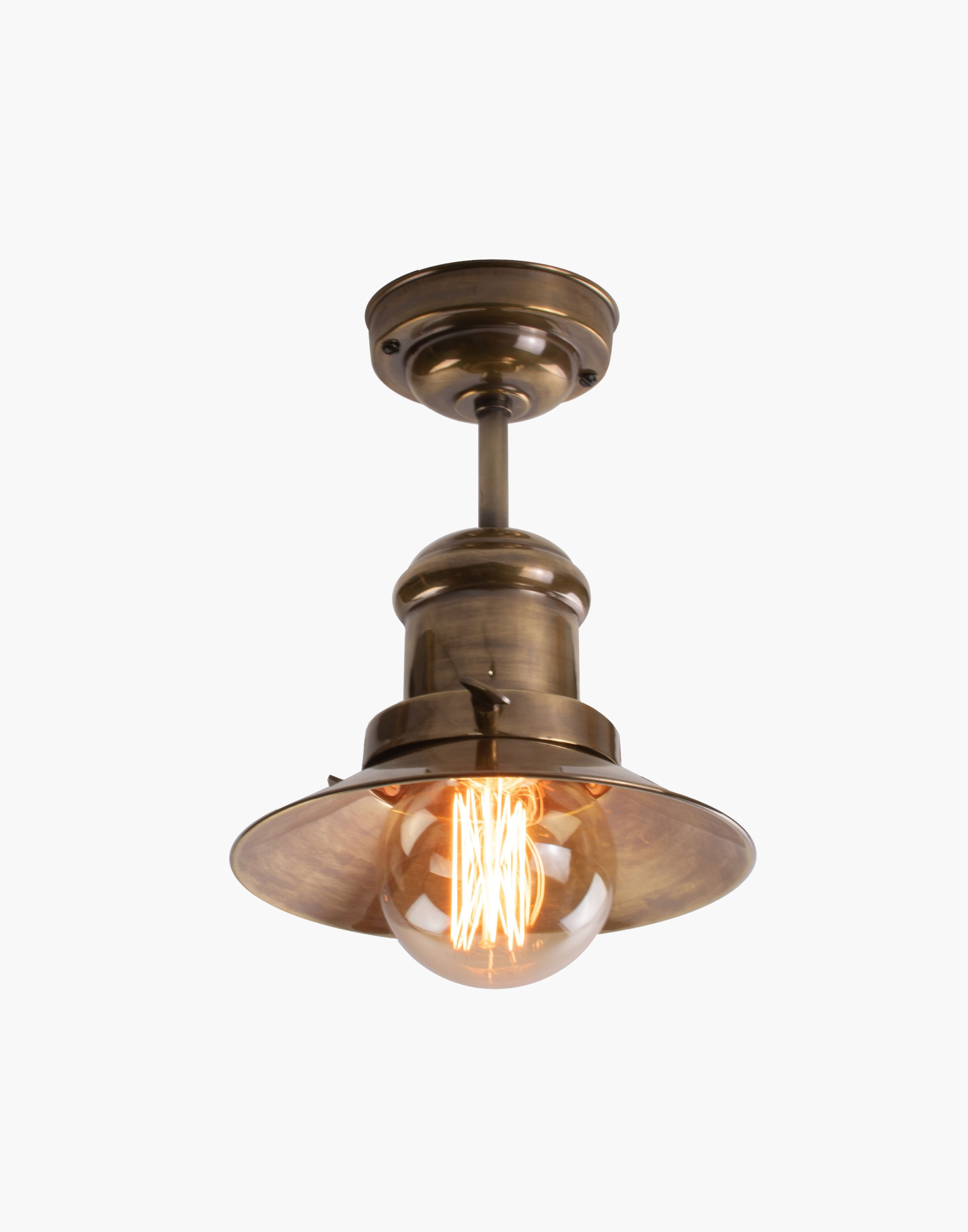 Flush ceiling light in solid brass with Ferrowatt squirrel cage bulb, flush mount fixture for low ceilings.