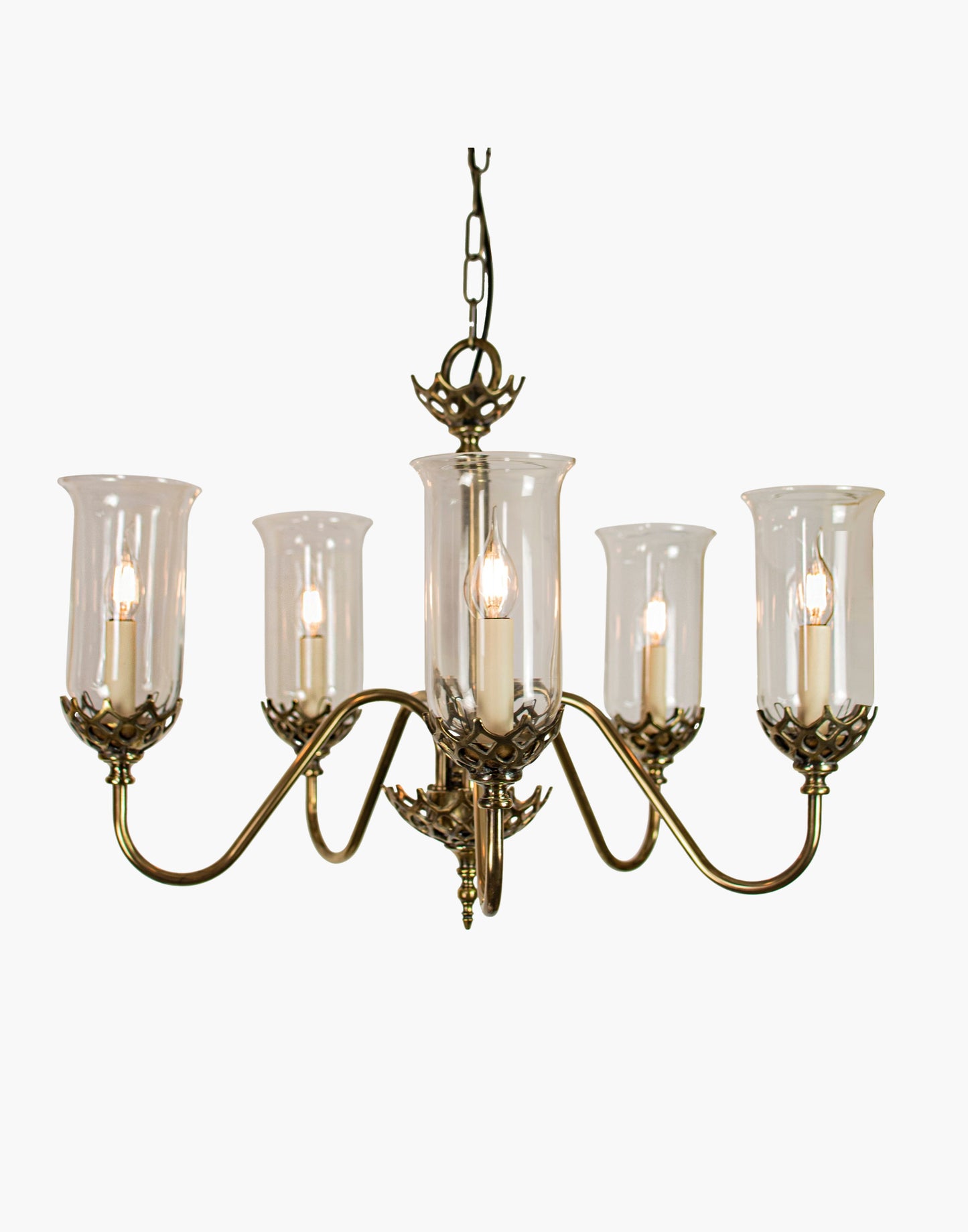 Five arm chandelier in cast brass with clear storm glasses, statement period ceiling light inspired by an 1800 Irish church original.