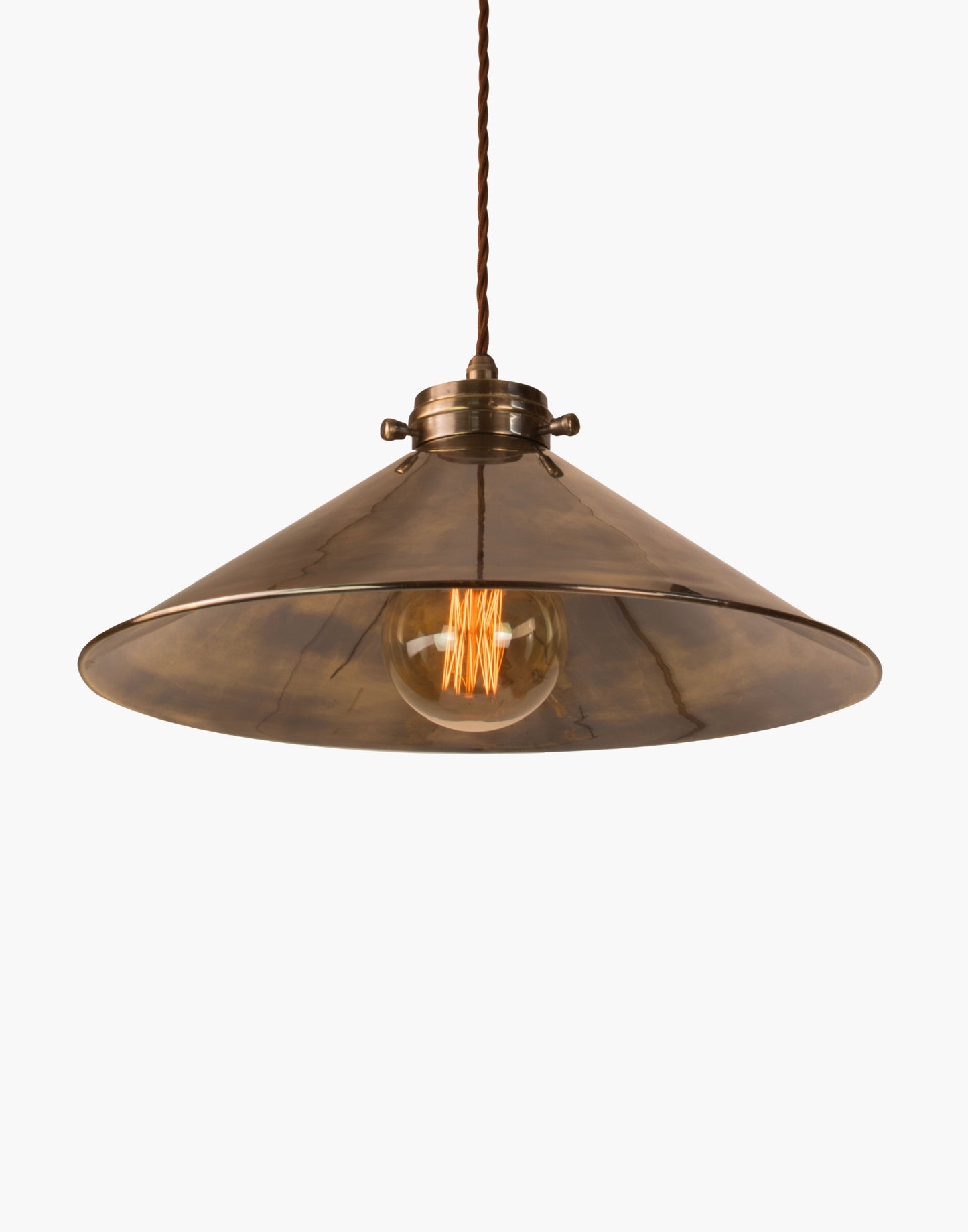 Brass pendant light with adjustable height and silk flex, focused illumination for kitchen islands and interior spaces